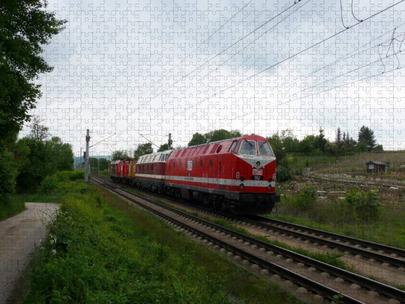 Ein Motiv aus dem Kalender U-Boot trifft Babelsbergerin. Die Baureihen 118 und 119 der Deutschen Reichsbahn - CALVENDO Foto-Puzzle'