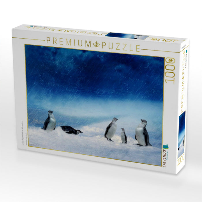Lustige Pinguinfamilie im Schneesturm - CALVENDO Foto-Puzzle'