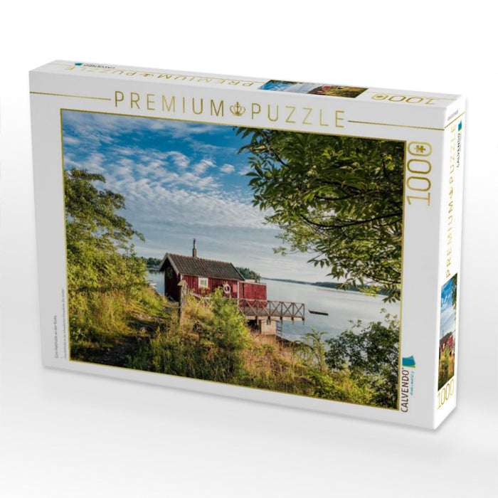 Eine Holzhütte an der Küste - CALVENDO Foto-Puzzle'