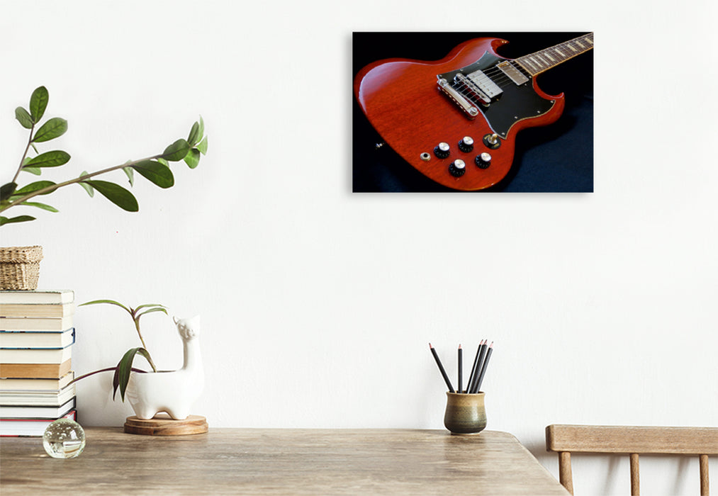Premium Textil-Leinwand Premium Textil-Leinwand 120 cm x 80 cm quer Legendäre rote E-Gitarre