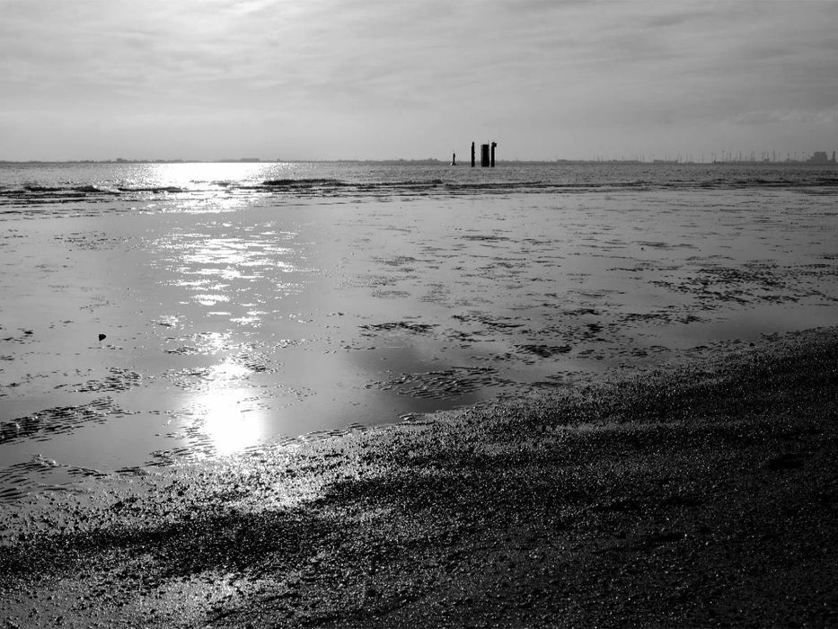 Sonnenstrahlen im Wattenmeer - CALVENDO Foto-Puzzle'