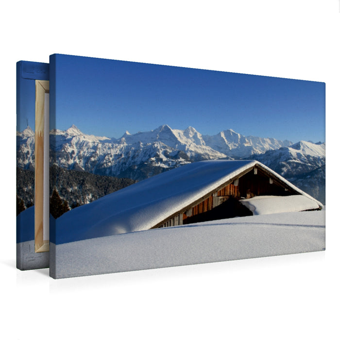 Toile textile haut de gamme Toile textile haut de gamme 120 cm x 80 cm paysage Conte de fées d'hiver - Cabane d'alpage enneigée - Eiger, Mönch, Jungfrau 