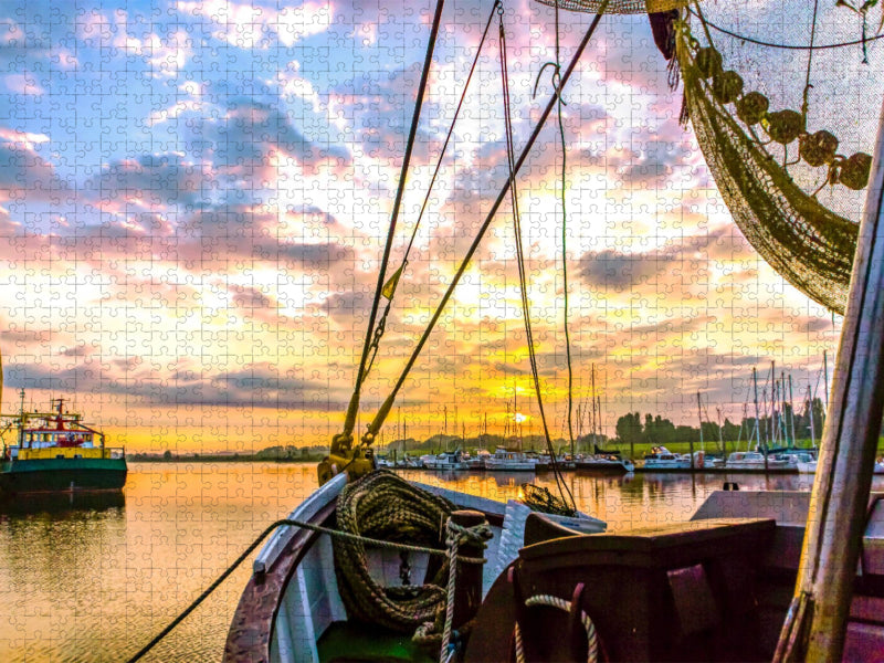 Blick durch ein Boot zum Sonnenaufgang - CALVENDO Foto-Puzzle'