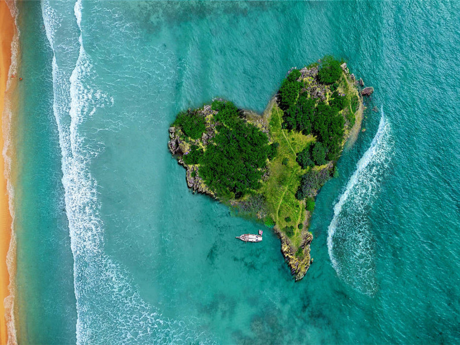 Herzförmige Tropeninsel aus der Vogelperspektive - CALVENDO Foto-Puzzle'