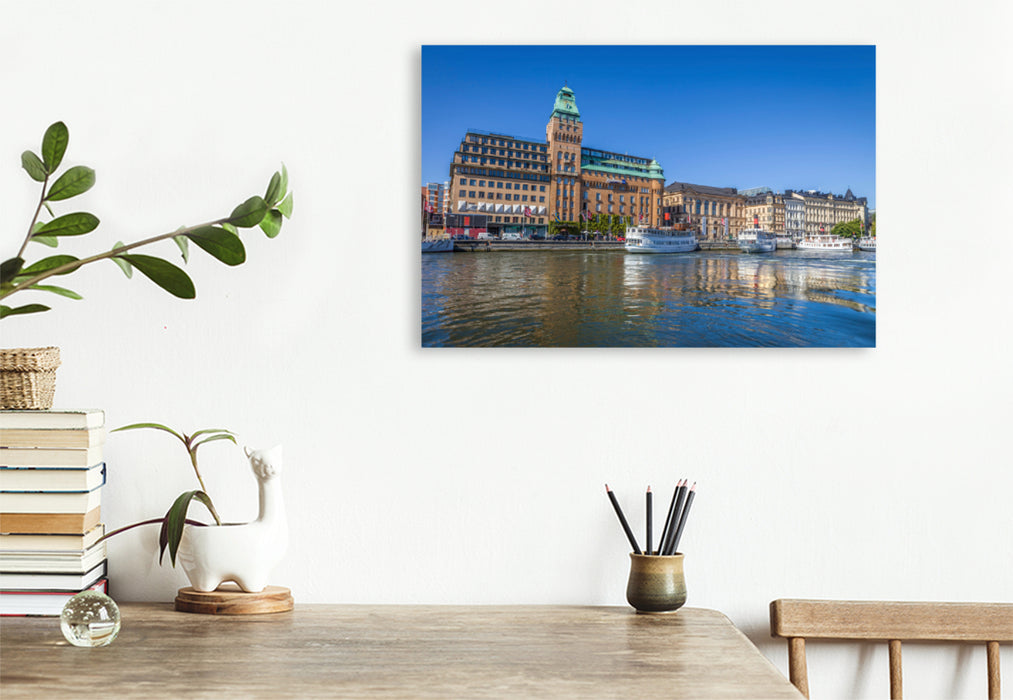 Premium textile canvas Premium textile canvas 120 cm x 80 cm landscape harbor of Stockholm with historic hotel and ferry boats 