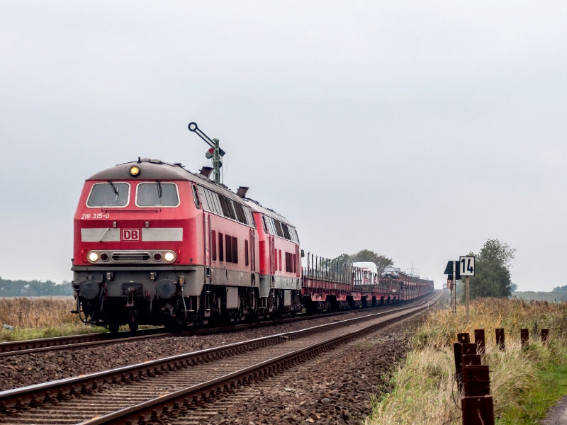Baureihe 218 mit Autozug in Klanxbüll 1000 Teile Puzzle quer - CALVENDO Foto-Puzzle'