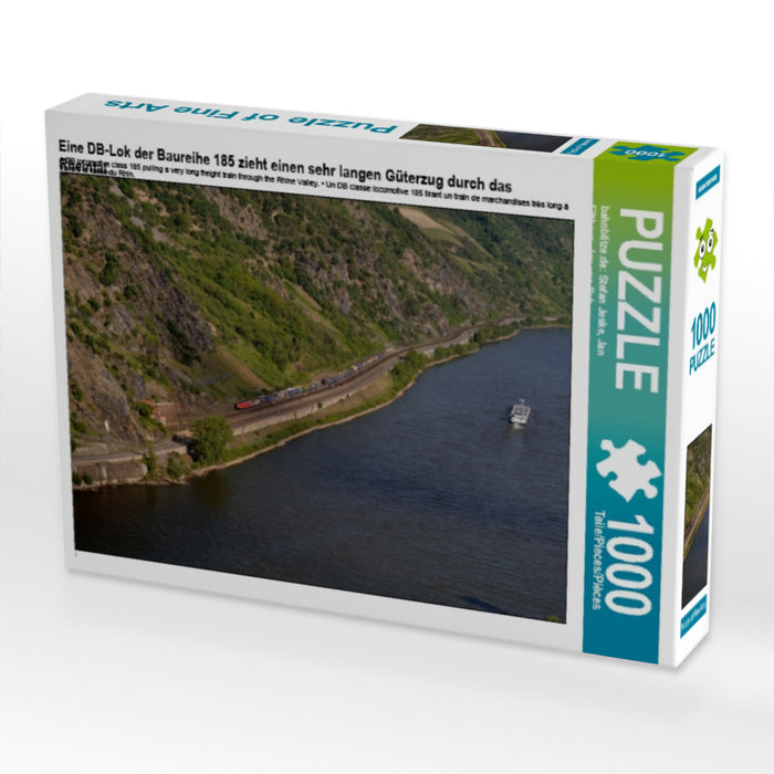 Eine DB-Lok der Baureihe 185 zieht einen sehr langen Güterzug durch das Rheintal. 1000 Teile Puzzle quer - CALVENDO Foto-Puzzle'