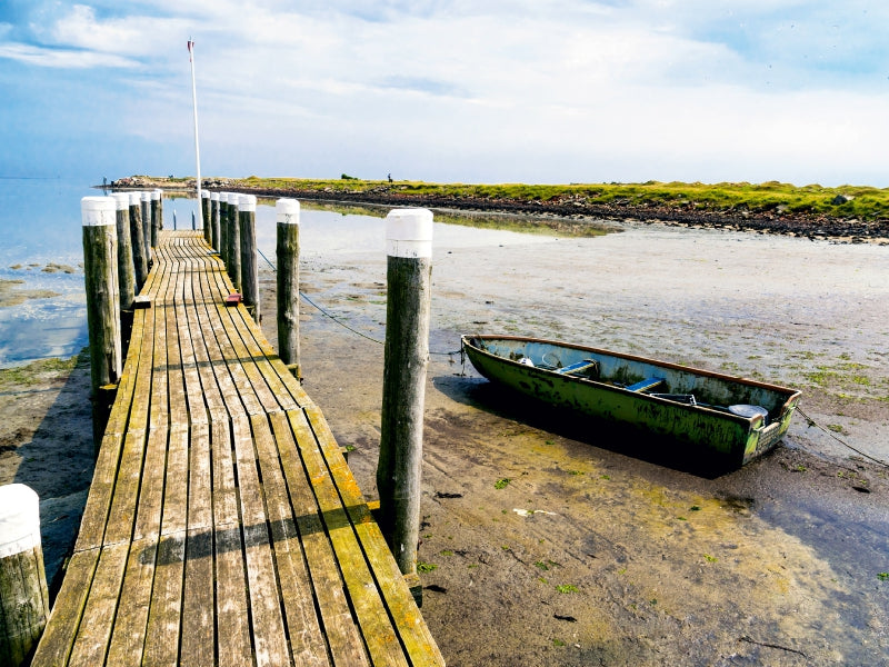 Boat in the mud flats - CALVENDO photo puzzle 