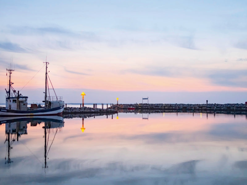 Ambiance nocturne dans le port de Timmendorf - Puzzle photo CALVENDO 