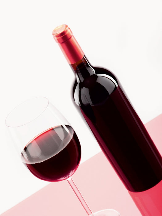 A glass of red wine with a bottle next to it - CALVENDO photo puzzle 