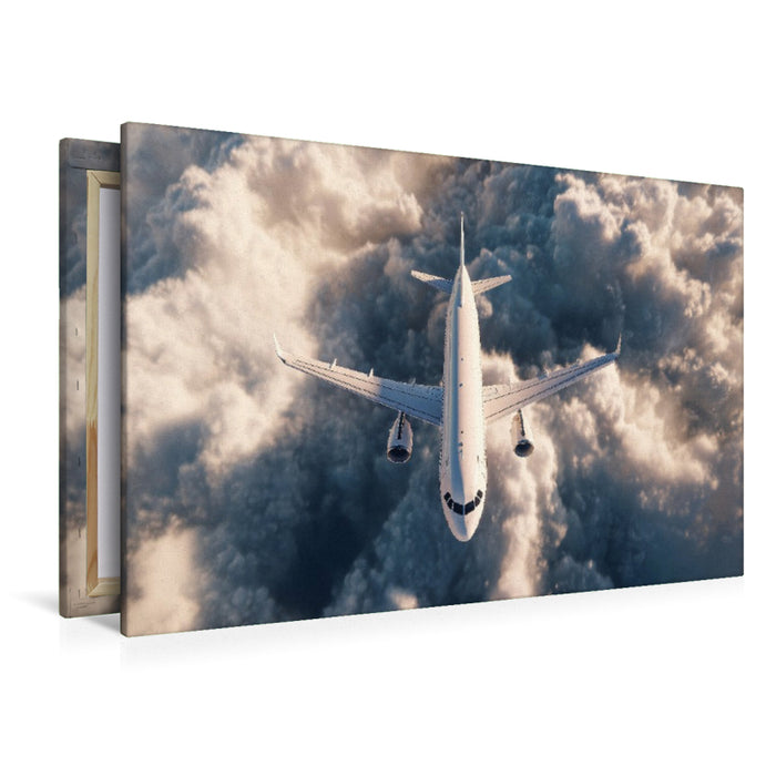 Premium Textil-Leinwand Flugzeug über den Wolken im Gegenlicht