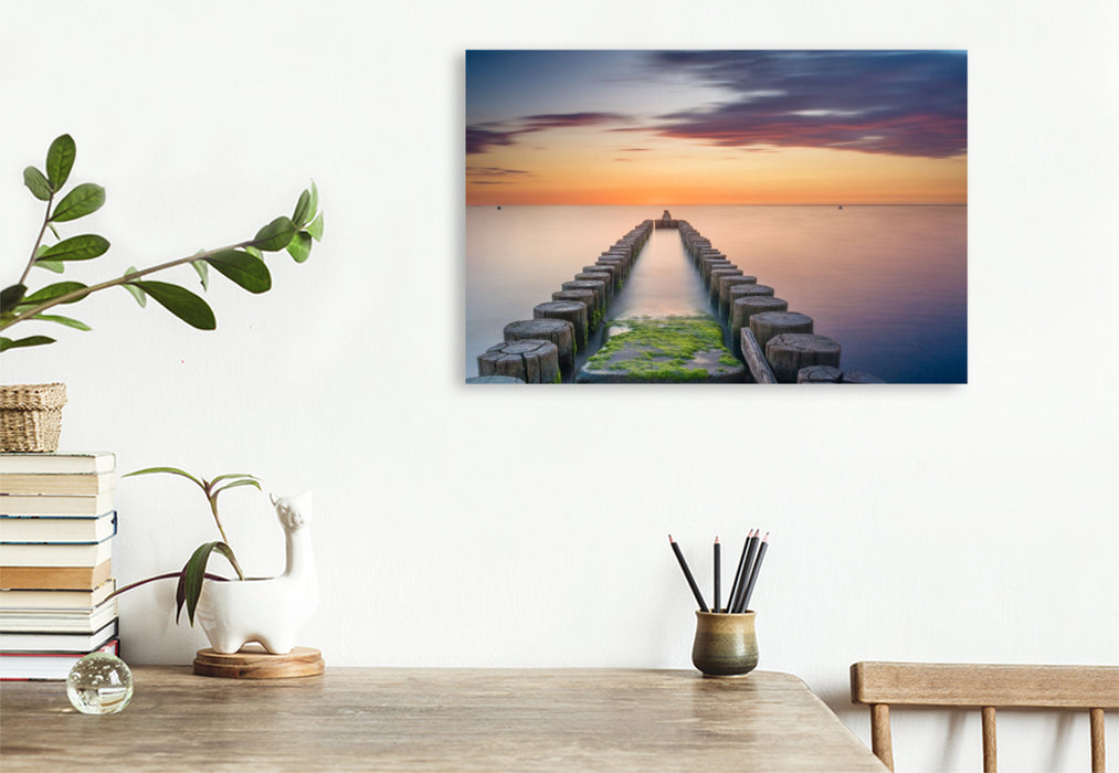 Premium Textil-Leinwand Buhnen beim Sonnenuntergang über der Ostsee