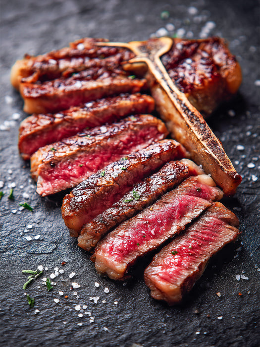 Saftiges T-Bone-Steak in Scheiben mit grobem Salz - CALVENDO Foto-Puzzle'