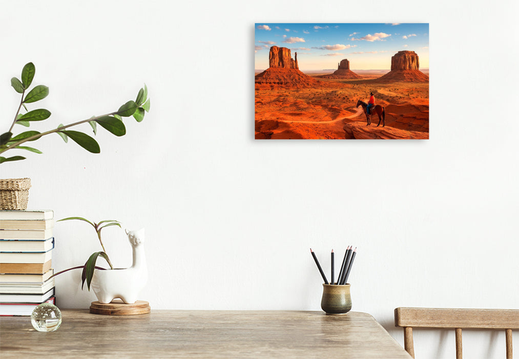 Premium Textil-Leinwand Monument Valley – Im Land der roten Riesen. Ein Cowboyblick über die Weiten des Wilden Westens