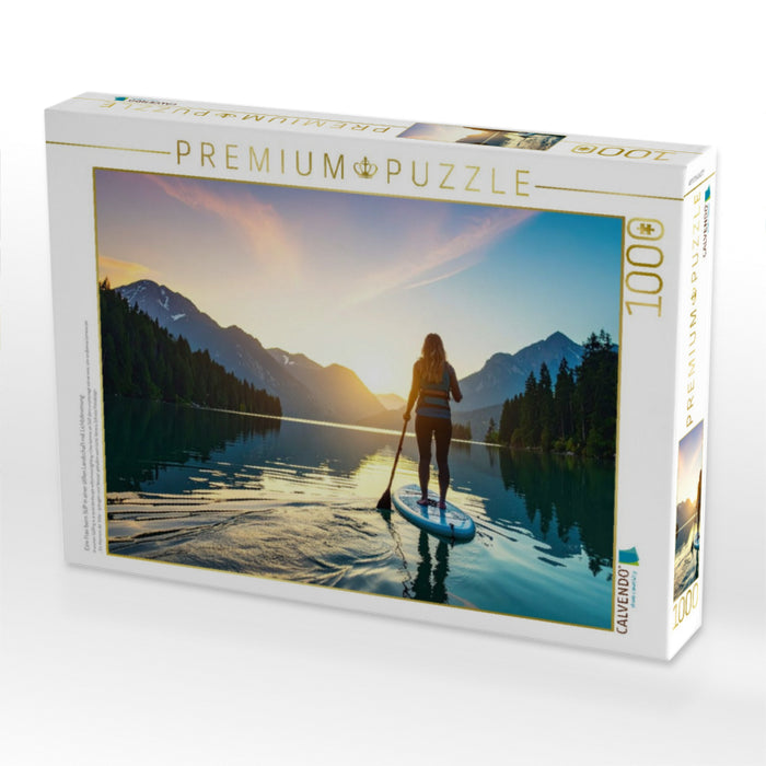 Eine Frau beim SUP in einer stillen Landschaft mit Lichtstimmung - CALVENDO Foto-Puzzle'