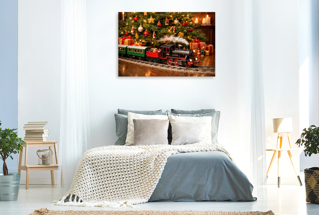 Premium Textil-Leinwand Weihnachtliche Eisenbahn unter dem Christbaum