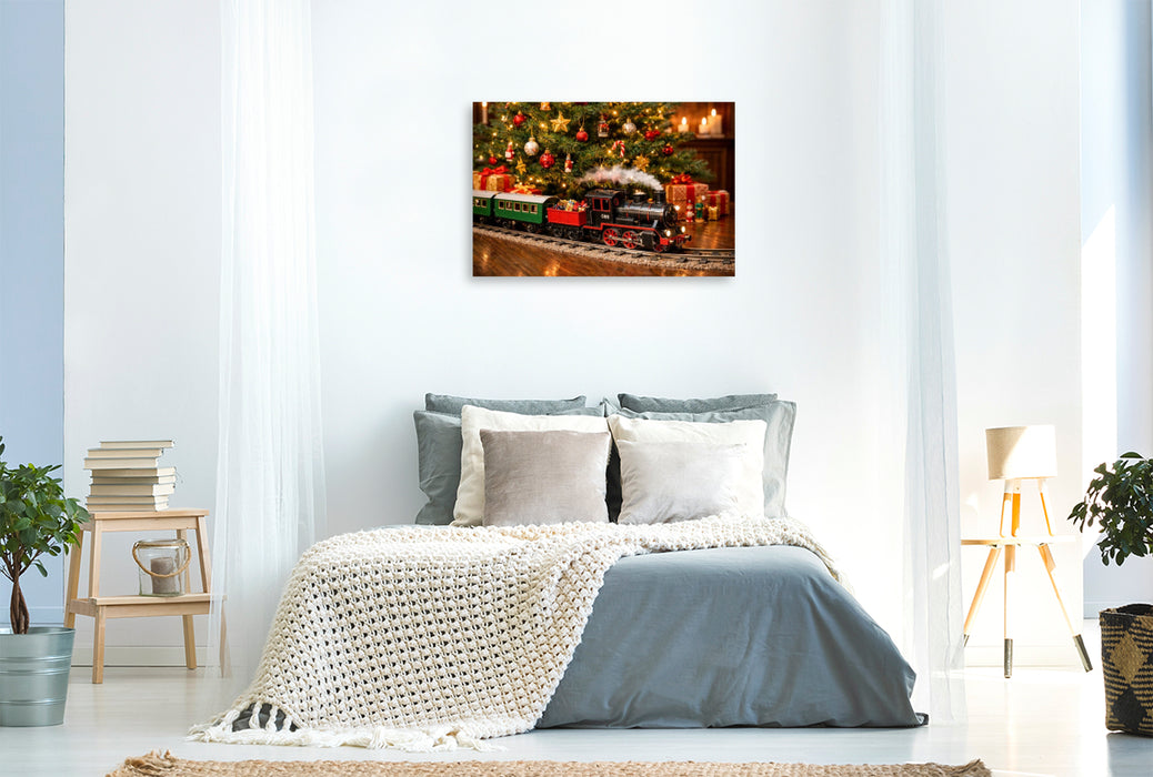 Premium Textil-Leinwand Weihnachtliche Eisenbahn unter dem Christbaum