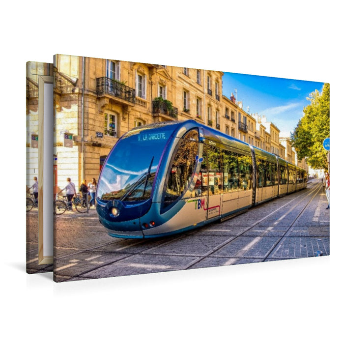 Premium Textil-Leinwand Eine hochmoderne Tram, unterwegs in Bordeaux
