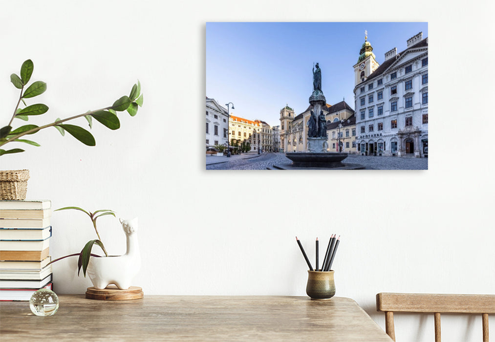 Premium Textil-Leinwand Austriabrunnen und Schottenkirche auf dem Platz Freyung in Wien