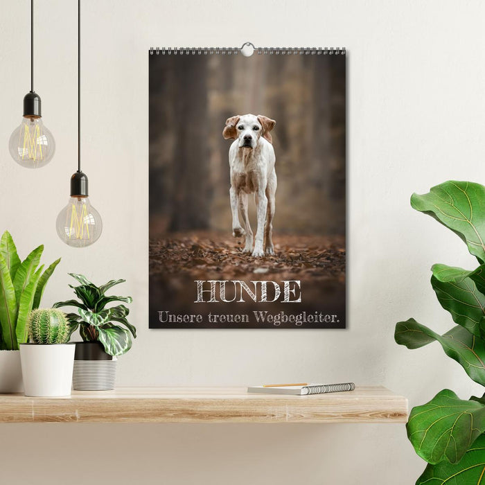 Hunde - Unsere treuen Wegbegleiter. (CALVENDO Wandkalender 2025)