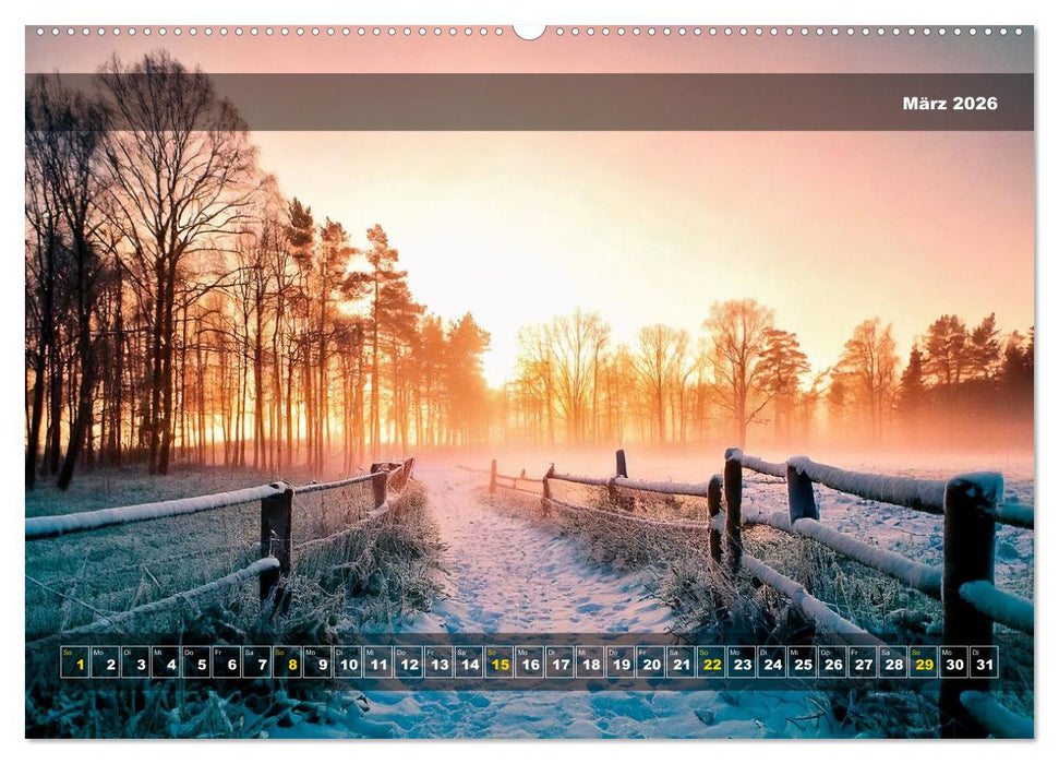 Verschneite Landschaft unter einer fahlen Wintersonne (CALVENDO Premium Wandkalender 2026)