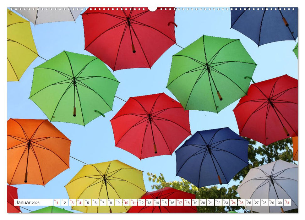 Umbrella Skies - Farbenfrohe Schirme (CALVENDO Premium Wandkalender 2026)