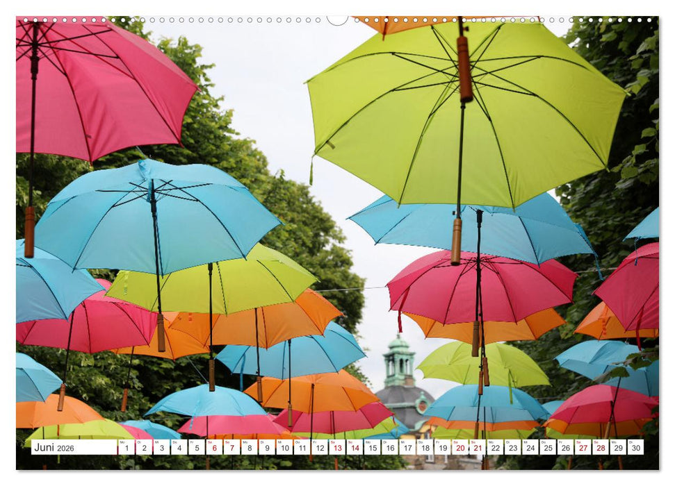 Umbrella Skies - Farbenfrohe Schirme (CALVENDO Premium Wandkalender 2026)