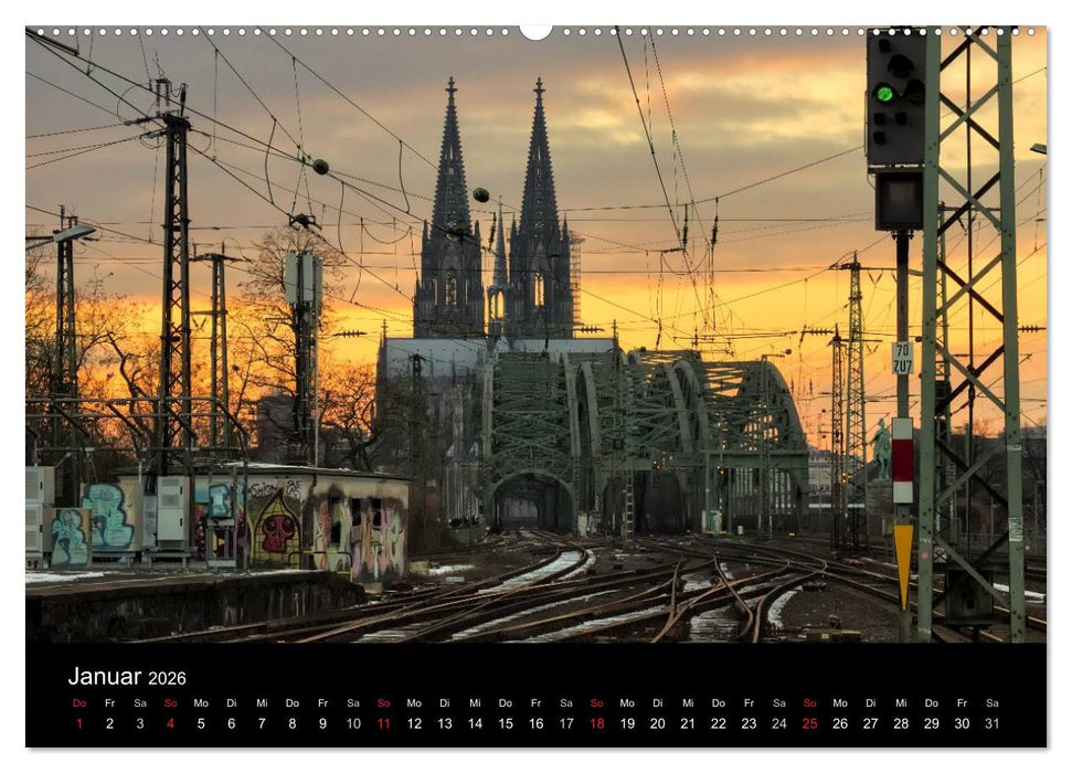 Köln bei Nacht - dunkelbunte Stadt (CALVENDO Premium Wandkalender 2026)