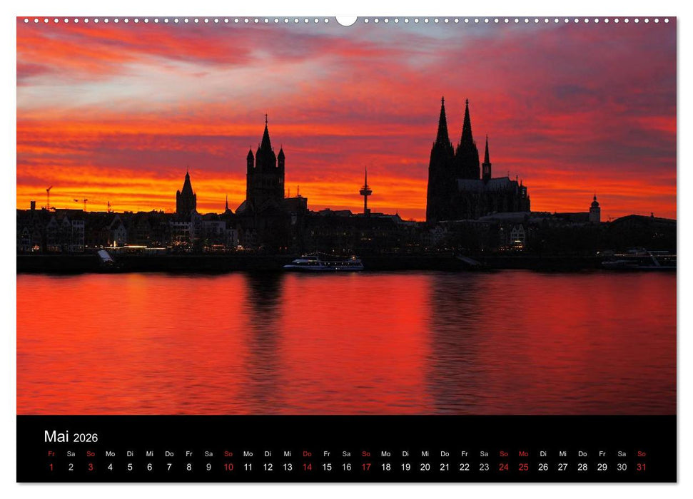 Köln bei Nacht - dunkelbunte Stadt (CALVENDO Premium Wandkalender 2026)