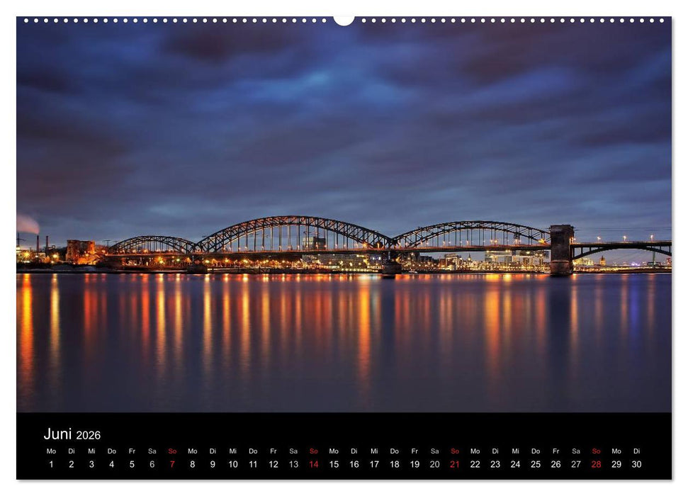 Köln bei Nacht - dunkelbunte Stadt (CALVENDO Premium Wandkalender 2026)