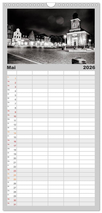 Ein Blick auf Husum (CALVENDO Familienplaner 2026)