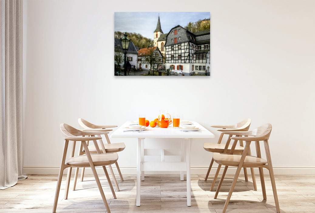 Premium Textil-Leinwand Premium Textil-Leinwand 120 cm x 80 cm quer Blick auf das Rathaus und Kirche in Blankenheim