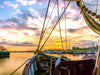 Blick durch ein Boot zum Sonnenaufgang - CALVENDO Foto-Puzzle - calvendoverlag 29.99