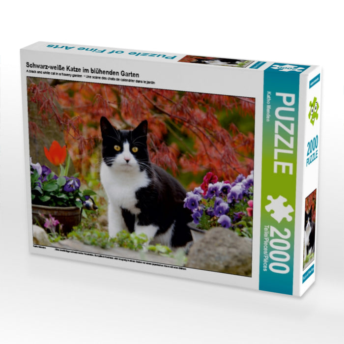 Schwarz-weiße Katze im blühenden Garten - CALVENDO Foto-Puzzle - calvendoverlag 29.99