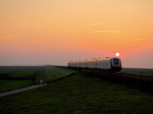 Die Nordostseebahn im Sonnenuntergang - CALVENDO Foto-Puzzle - calvendoverlag 29.99
