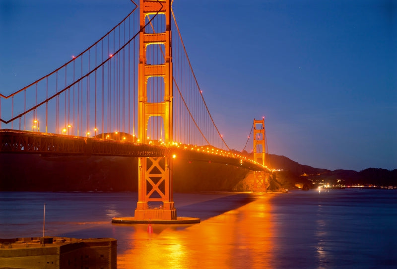 Premium Textil-Leinwand Premium Textil-Leinwand 120 cm x 80 cm quer die beleuchtete Golden Gate Brücke
