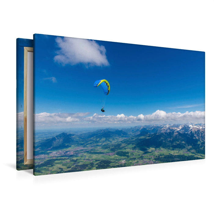 Premium textile canvas Premium textile canvas 120 cm x 80 cm landscape paragliding in the Allgäu 