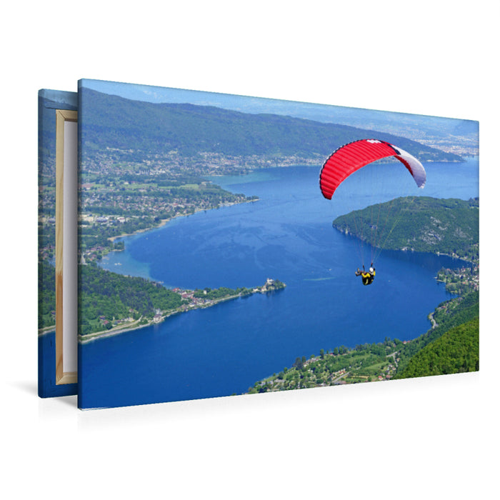 Premium Textil-Leinwand Premium Textil-Leinwand 120 cm x 80 cm quer Paragleiter über dem See Lac d'Annecy.