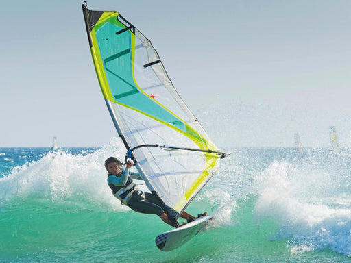 Sportliche junge Windsurferin in der schäumenden Welle. - CALVENDO Foto-Puzzle - calvendoverlag 29.99