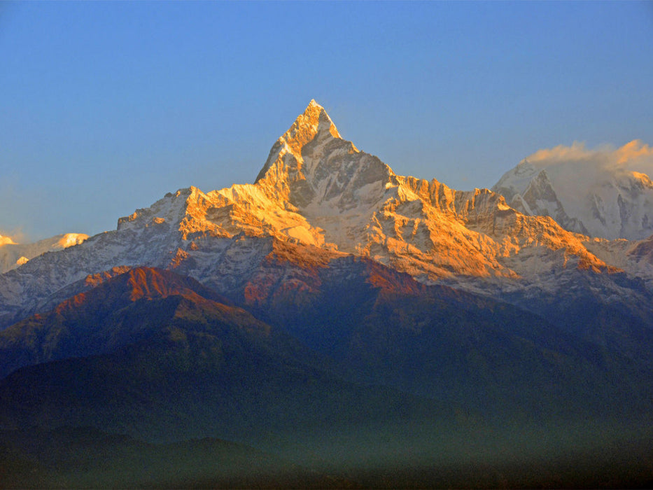L'impressionnant Machhapuchhre (6993 m) au petit matin depuis le point de vue de Sarangkot - Puzzle photo CALVENDO' 