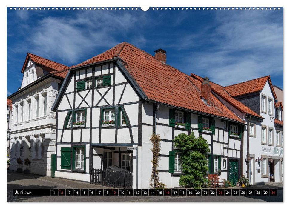 On the road in the old village of Westerholt (CALVENDO Premium wall calendar 2024) 