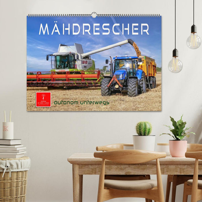 Combine harvester - autonomously on the move (CALVENDO wall calendar 2024) 