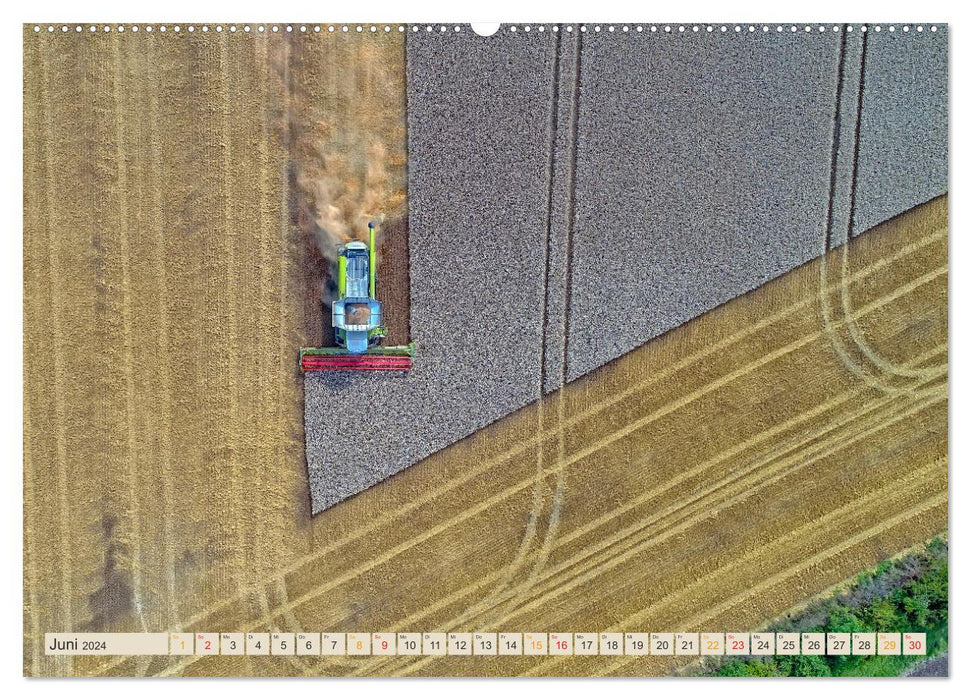 Combine harvester - autonomously on the move (CALVENDO wall calendar 2024) 